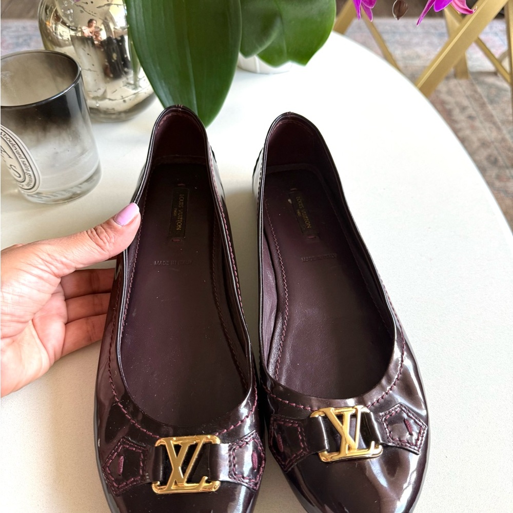 Louis Vuitton Burgundy Flats with Gold Logo Embellishment